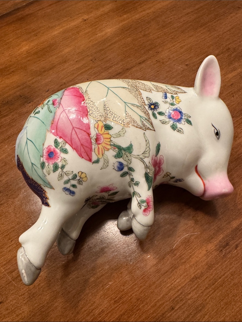 Decorative Floral Porcelain lounging Pig Figurine - White with Pink Accents